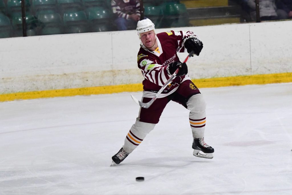 David Longstaff feeds the puck into a shooting lane