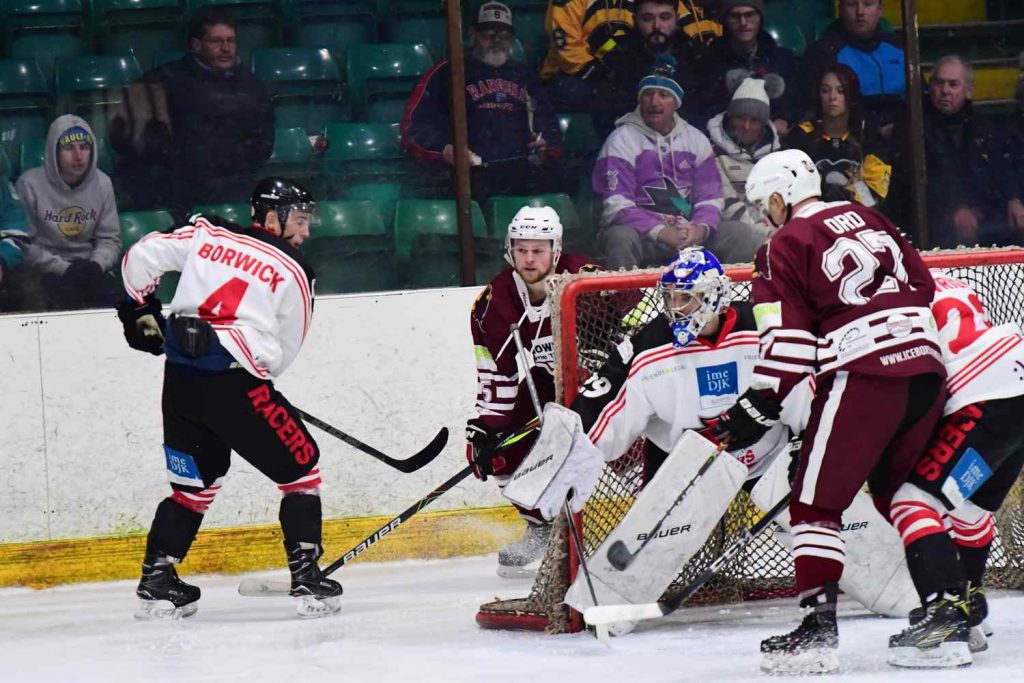 Mark McGill tracks the puck from Anthony Wetherell