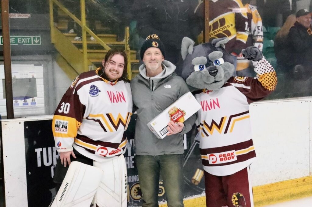 Jamie Mableson (Fuse) with Warriors netminder Thomas Brown and mascot Whitley Wolf